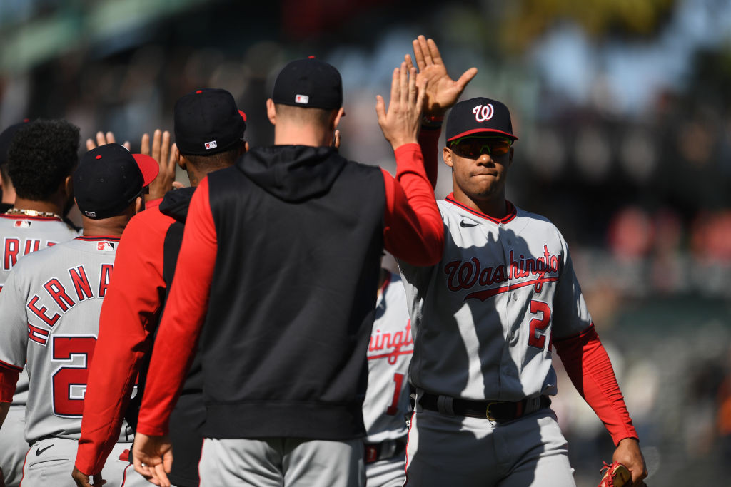 Juan Soto fives gray