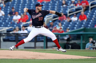 Stephen Strasburg throwing blue home