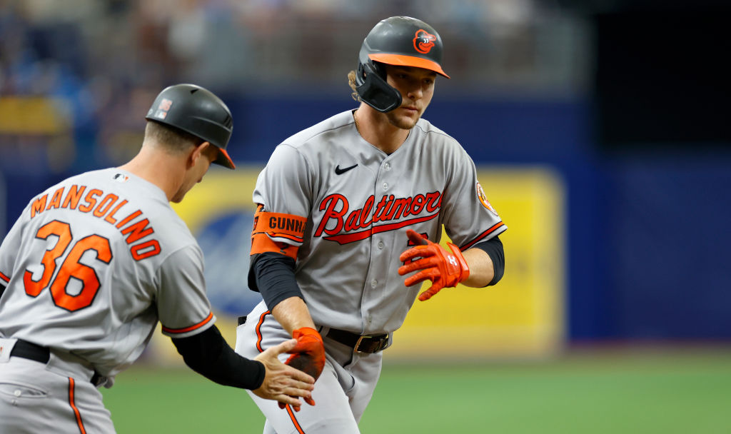 Orioles score six in ninth, hold on to beat Rays 9-6