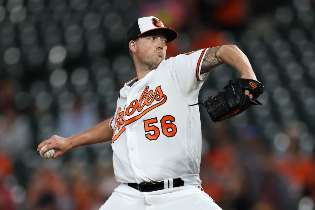 Kyle Bradish pitching white 