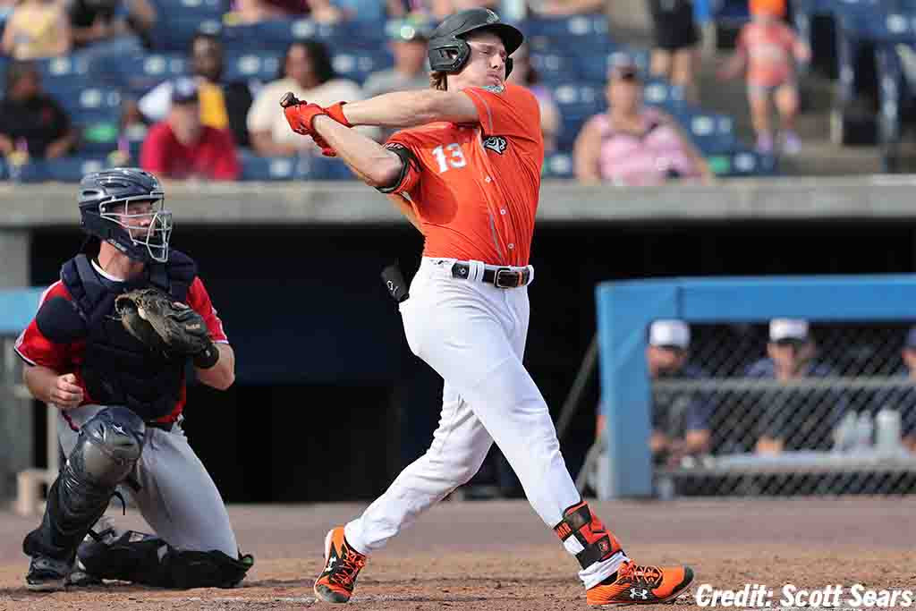 Gunnar_Henderson_Norfolk_swing_orange