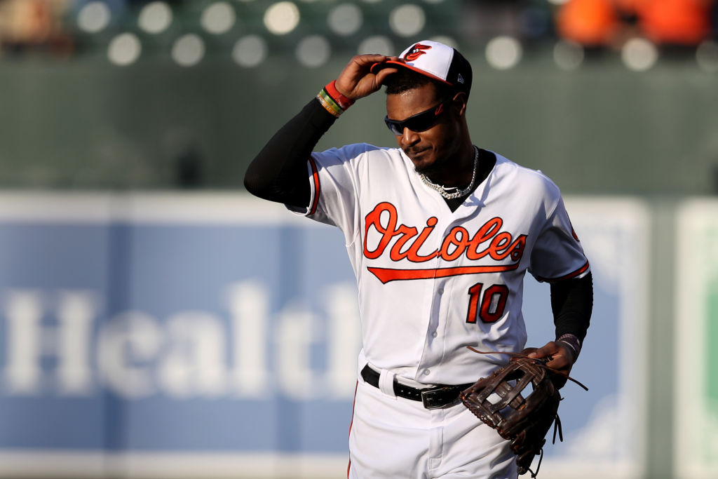 Baltimore Orioles Adam Jones celebrates with fans after the