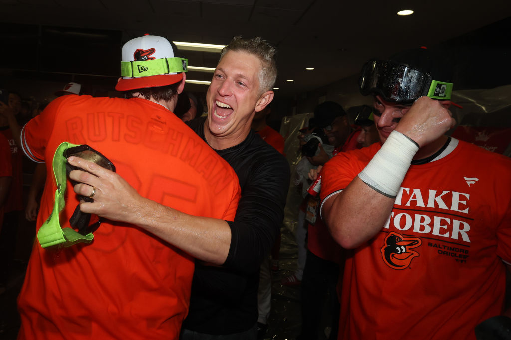 Orioles celebrate playoff clinching and turn attention to division title